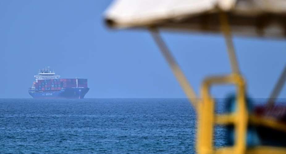 A container ship off the coast of the Emirate of Sharjah in the Gulf of Oman, June 28, 2026. -  AFP
