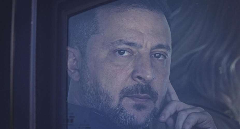Ukraines President Volodymyr Zelenskyy looks out from his car window as he arrives for the NATO summit in Ankara, Turkey, July 7, 2026. -  Metin Akta/Pool Anadolu via AP