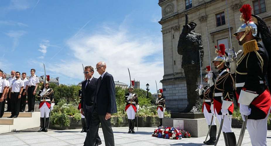 Frances President Emmanuel Macron and Charles Dreyfus, grandson of Alfred Dreyfus, pay tribute to the French army officer on the first national day of commemoration in his memory. Dreyfus was wrongfully convicted of treason in a case that exposed institutional antisemitism in 19th-century France. -  AFP - THOMAS SAMSON