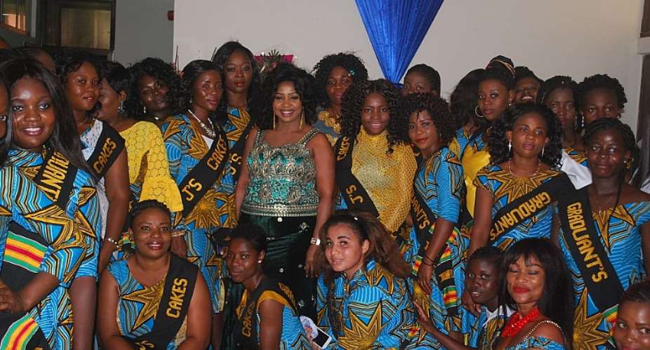 CEO Josephine Ismaila flanked by the students