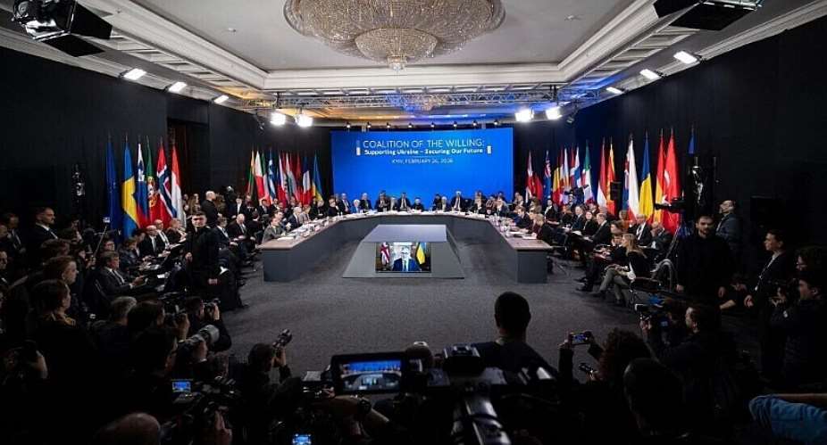 In this handout photograph taken and released by the Ukrainian Presidential Press Service on February 24, 2026, Ukraines President Volodymyr Zelensky (C) chairs a meeting of Coalition of the Willing in Kyiv, as Ukraine marks the fourth anniversary of Russias full-scale invasion. - AFP - HANDOUT