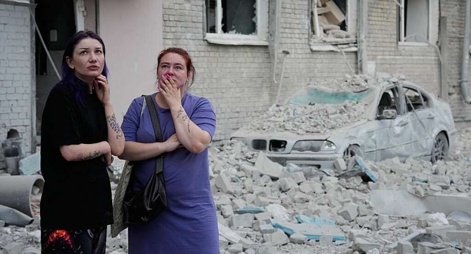 Kyiv residents examine the destruction from a Russian missile strike on an apartment building on July 2, 2026. -  Efrem Lukatsky, AP