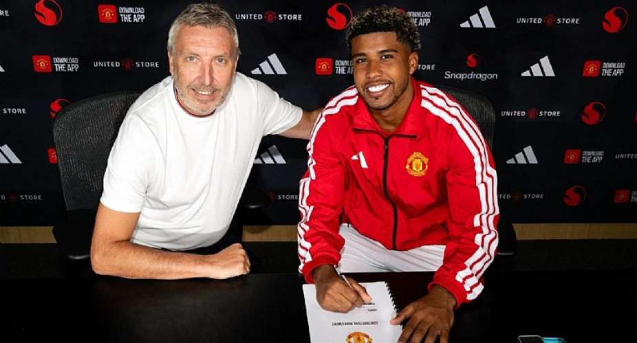 Getty ImagesImage caption: Manchester Uniteds new signing Andrey Santos with director of football Jason Wilcox (left)