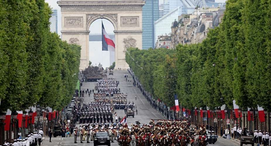 File photo: Frances President and the Chief of the Defence Staff General review troops during the annual Bastille Day military parade with on the Champs-Elysees Avenue in Paris on July 14, 2025. -  Ludovic Marin, AFP