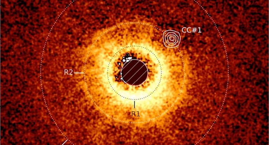  AM Lagrange et  al/JWST/ESO/Handout via REUTERS