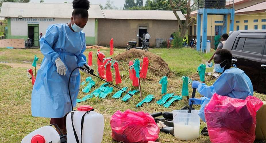 Medical workers disinfect their equipment at an Ebola treatment centre at the Rwambara General Reference Hospital in Bunia, eastern Democratic Republic of Congo, on 16 June, 2026. - REUTERS - Gradel Muyisa Mumbere
