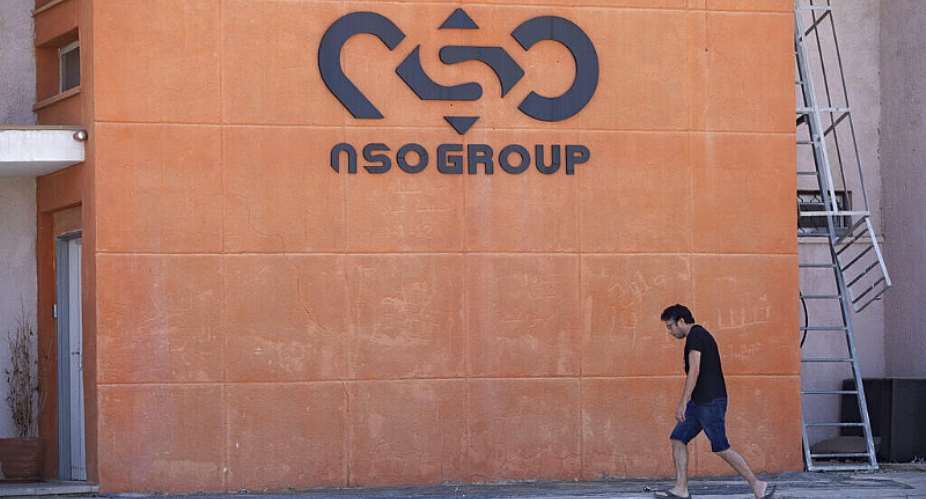 A logo adorns a wall on a branch of the Israeli tech company NSO Group, near the southern Israeli town of Sapir, August 24, 2021. -  Sebastian Scheiner, AP