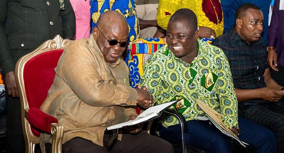 President Akufo-Addo in a handshake with the CEO of YEA, Kofi Agyapong