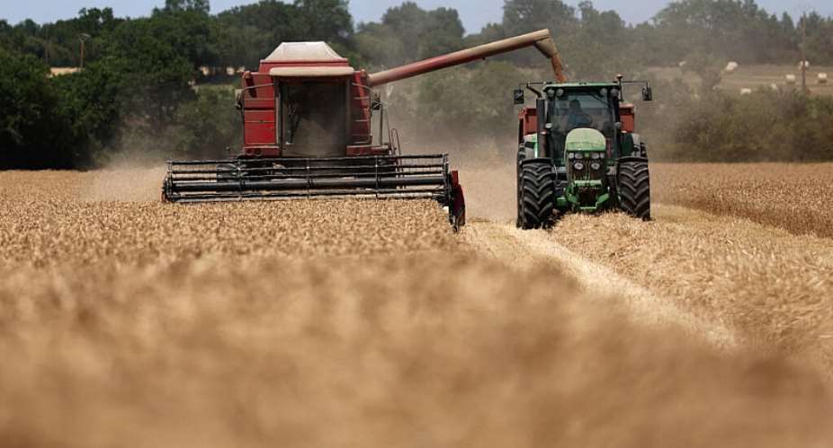 A French farmer harvests wheat in his field, in Ligne, near Nantes, western France, 30 June 2026. -  Stephane Mahe/Reuters