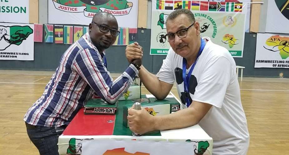 Osei Asibey L And African Armwrestling President Mahoud Mahoud In Action