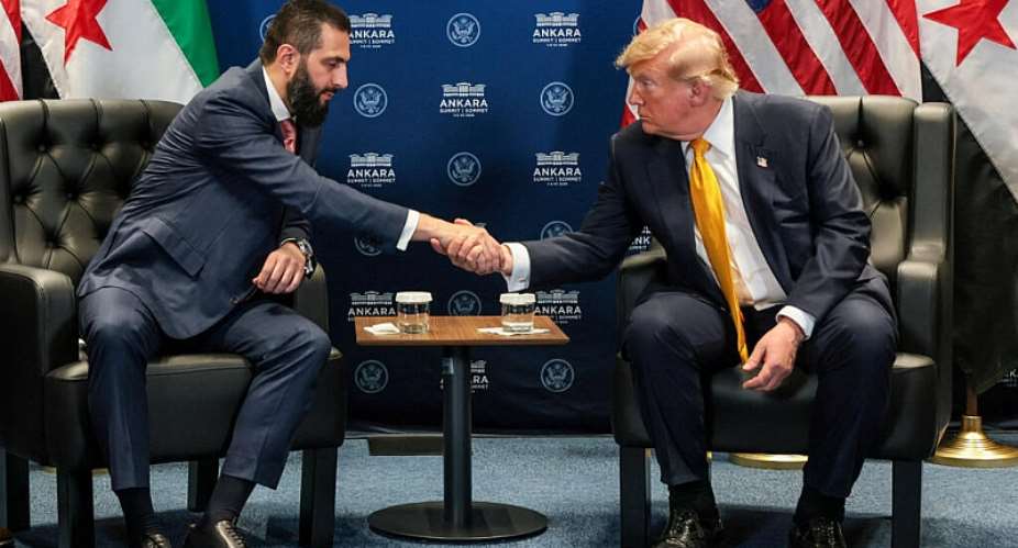 Donald Trump shakes hands with Ahmed al-Sharaa during a bilateral meeting alongside the NATO summit in Ankara, 8 July. - REUTERS - Jonathan Ernst