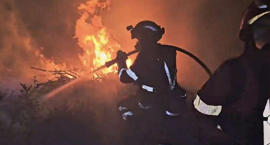 A screen grab taken from footage released on July 18, 2026 shows the military fighting a massive wildfire in a sparsely populated part of the Aragon region in northeastern Spain. -  Military Emergencies Unit (UME) via AFP