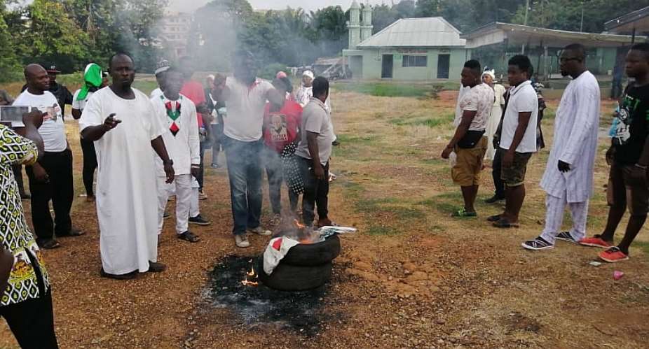 Asawase NDC: Supporters Of Muntakas Contender Burn Tyres, Posters