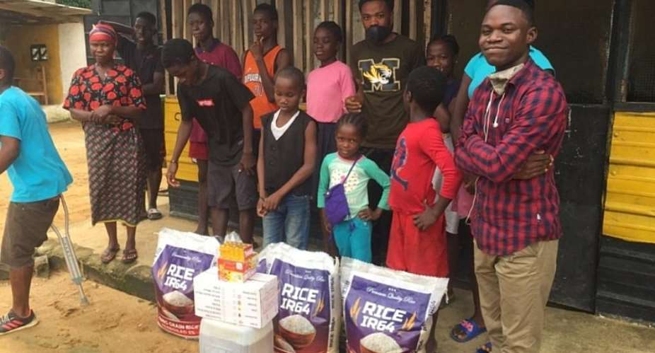 Mohammed Kerkulah Of YALDA Liberia Far Right With Some Beneficiaries Of Items At One Of The Orphanages They Made Donations To