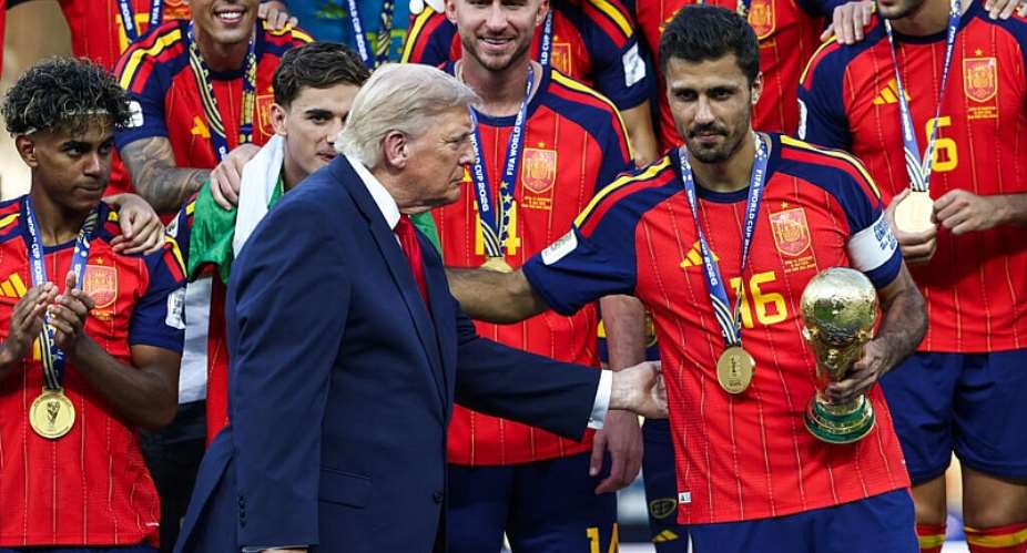 Spains midfielder #16 Rodri receives the trophy from US President Donald Trump after winning the 2026 World Cup football tournament final match between Spain and Argentina at the New York/New Jersey Stadium in East Rutherford on July 19, 2026. -  Franck Fife, AFP