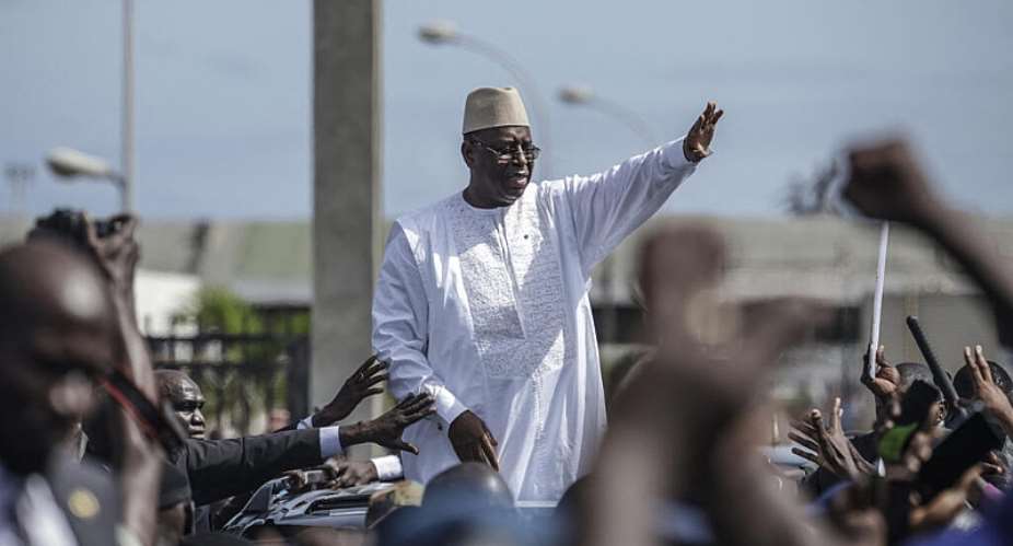 Supporters welcome former Senegalese president Macky Sall at the Leopold Senghor Military airport in Dakar on July 17, 2026. -  Patrick Meinhardt, AFP