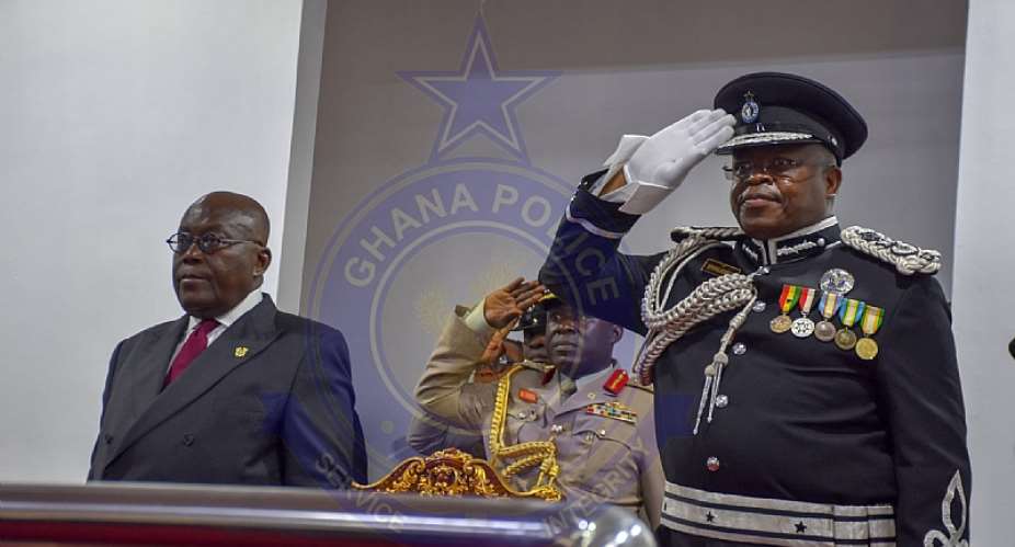 President Akufo-Addo Left with outgoing IGP James Oppong-Boanuh Right