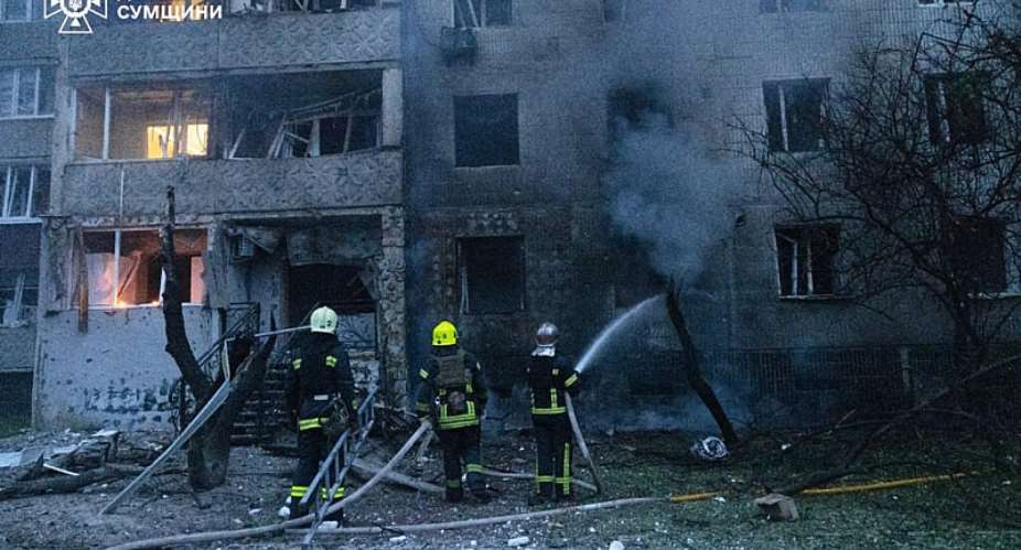 In this photo provided by the Ukrainian Emergency Service, firefighters put out a fire of residential building following a Russian air attack in Sumy, Ukraine, Tuesday, July 21, 2026. -  Ukrainian Emergency Service via AP