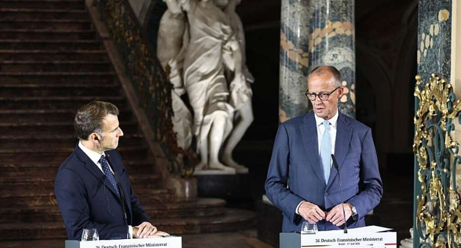 German Chancellor Friedrich Merz and French President Emmanuel Macron hold a press conference following a meeting of the Franco-German Ministerial Council in Brhl,  Germany, Friday, July 17, 2026. (Oliver Berg/dpa via AP) - Oliver Berg/DPA via AP - Oliver Berg