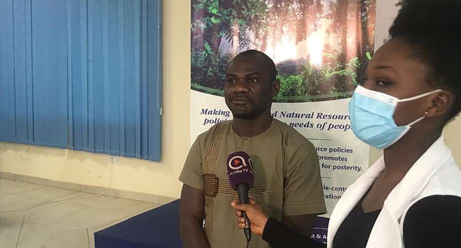 Managing campaigner for EcoCare Ghana, Obed Owusu-Addai  engaging the media after the programme