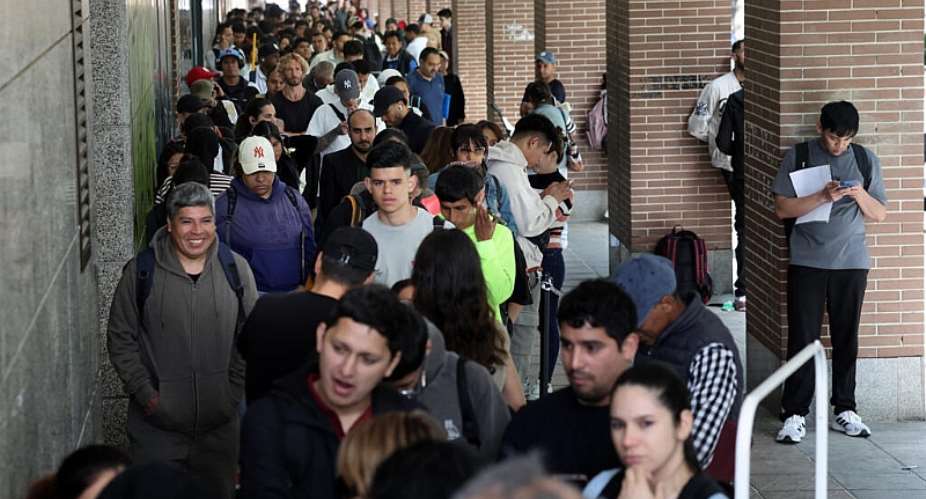 Streams of men, women and children have queued in the streets to obtain documents and attend appointments for their regularisation. -  Thomas Coex, AFP