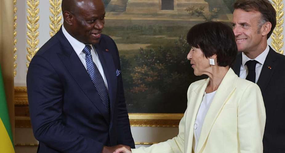 Frances President Emmanuel Macron, right, watches as CEO of the Eramet Group, Christel Bories, centre, shakes hands with Gabons President Brice Oligui Nguema during a signing ceremony at the Elysee Palace in Paris, Monday, 20 July 2026. -  Ludovic Marin / Pool AFP via AP