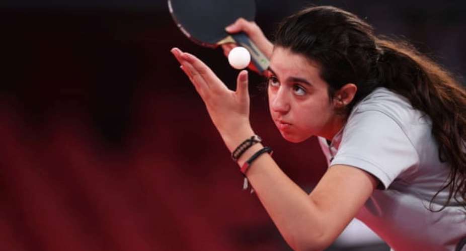 Syria's Hend Zaza serves in her preliminary round defeat by Austria's Liu Jia. Photograph: Luisa GonzlezReuters