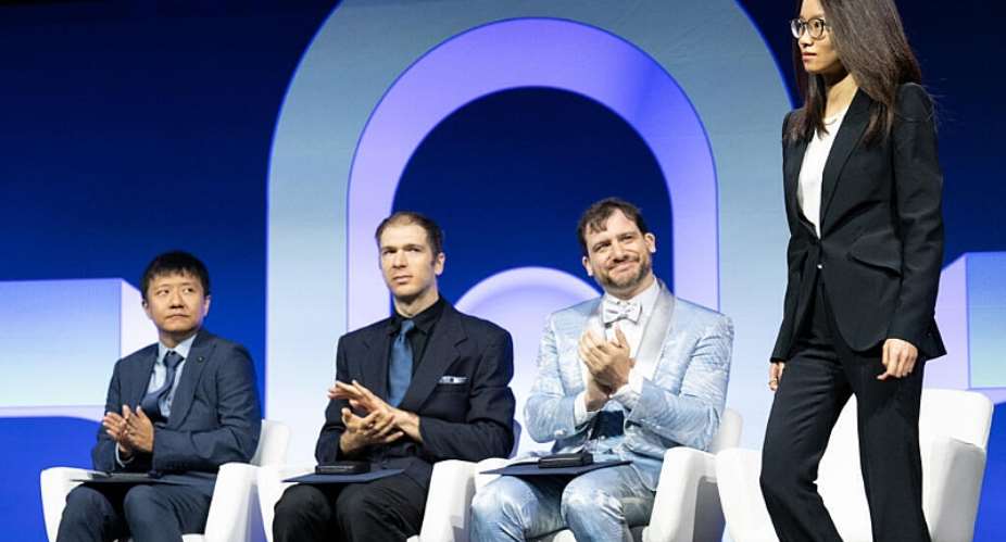 Mathematicians Yu Deng, John Pardon, Jacob Tsimerman and Hong Wang are awarded the Fields medal in Philadelphia on July 23, 2026. -  Erin Blewett, AFP