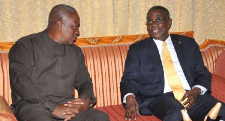 Former President John Dramani Mahamaleft and late President John Atta Mills