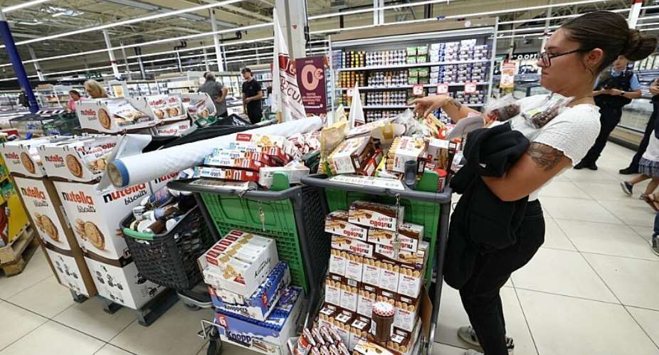 Members of the agricultural unions FDSEA 72 and Jeunes Agriculteurs (JA) farmer unions, remove from shelves goods containing some acetamiprid, a neonicotinoid pesticide, during a protest operation at a supermarket in Mundolsheim, on August 20, 2025. -  Frederick Florin, AFP