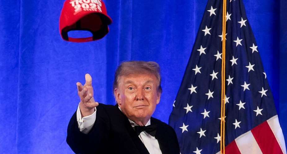 US President Donald Trump throws a Trump 2028 cap during mentalist Oz Pearlmans performance at the White House Correspondents Association Dinner at the Waldorf Astoria hotel in Washington, DC, US, July 24, 2026. -  Jonathan Ernst, Reuters