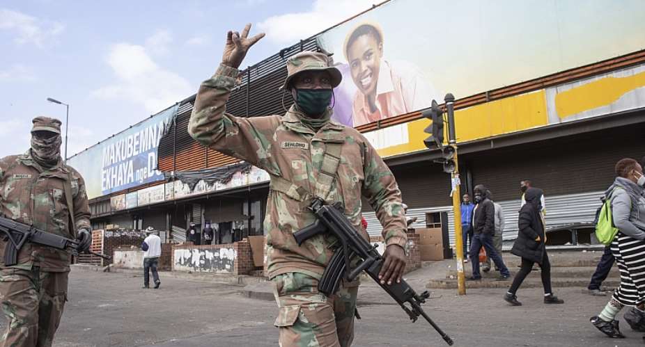 South African Defence Force troops on patrol in Alexandra, Johannesburg, following recent violence and looting.  - Source: EFE-EPAKim Ludbrook