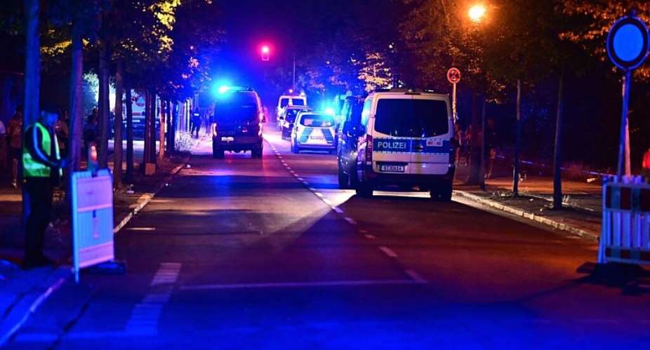 Police officers are on the scene following the cancellation of Christopher Street Day in Berlin, on Saturday, July 25, 2026. - Fabian Sommer/DPA via AP - Fabian Sommer