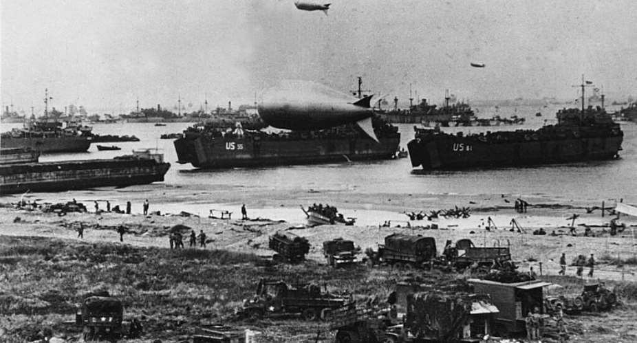 US troops disembark from landing crafts during D-Day circa 06 June 1944 after Allied forces stormed the Normandy beaches. -  AFP - -Imperial War Museum