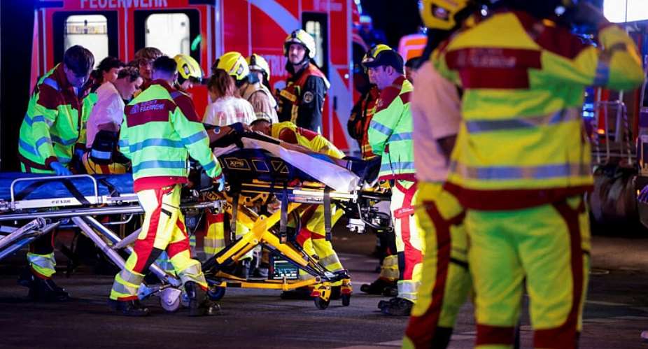 Emergency responders work onsite at Berlin Pride after a car crashed into the crowd at Tiergarten park, leaving several people injured on July 25, 2026. -  Christian Mang, Reuters