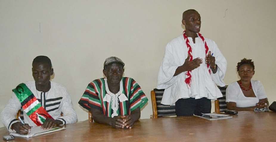 George Akanfari PPP flanked by NDC members and a PPP member