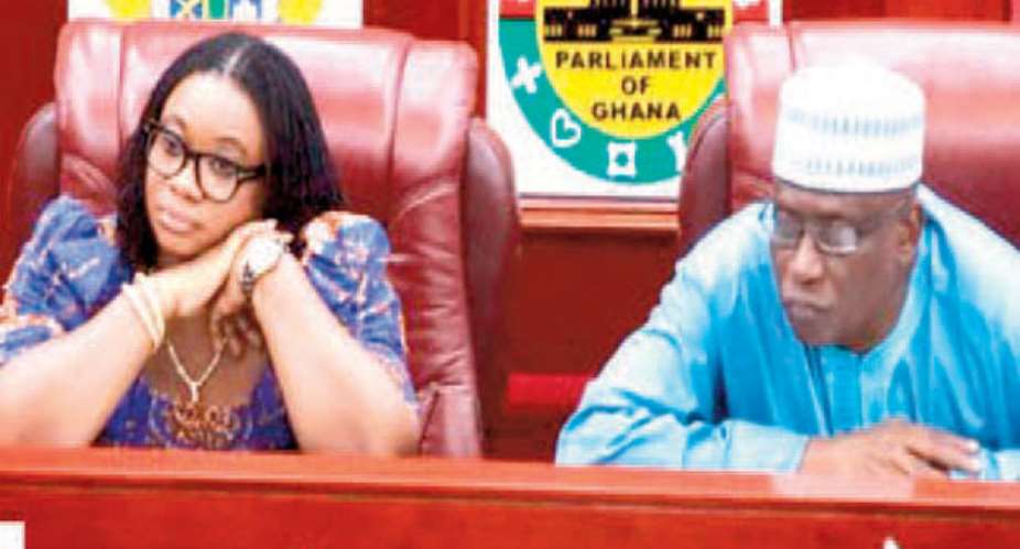 COLD WAR! Charlotte Osei and Amadu Sulley at Parliament House yesterday