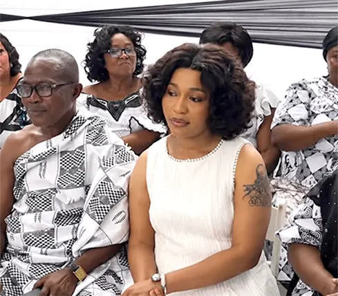 Odo Broni seated with family members