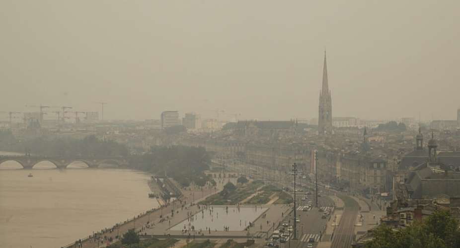 This photograph shows smoke from nearby wilfires covering the skyline of the city of Bordeaux on July 26, 2026. -  Ed Jones, AFP