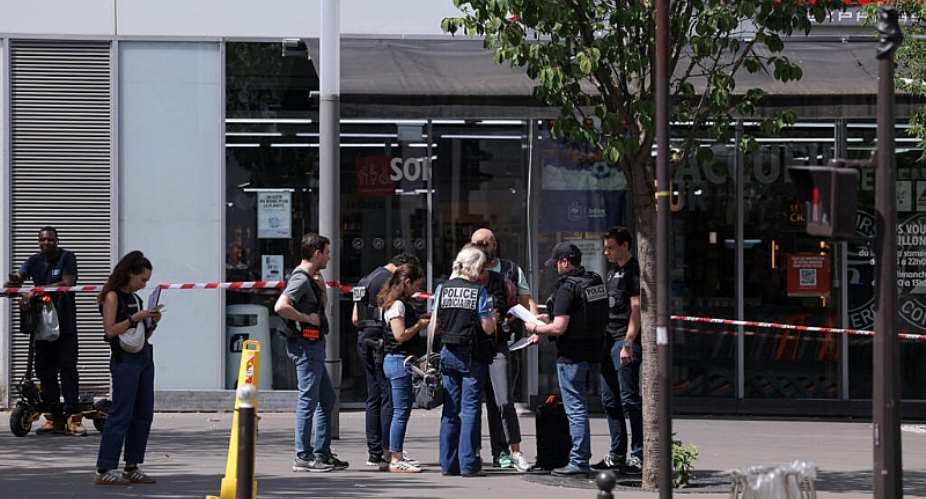 Police work in a cordoned off area after a knife-wielding man wounded three people in Paris on 27 July, 2026. -  AFP - Kenzo Tribouillard