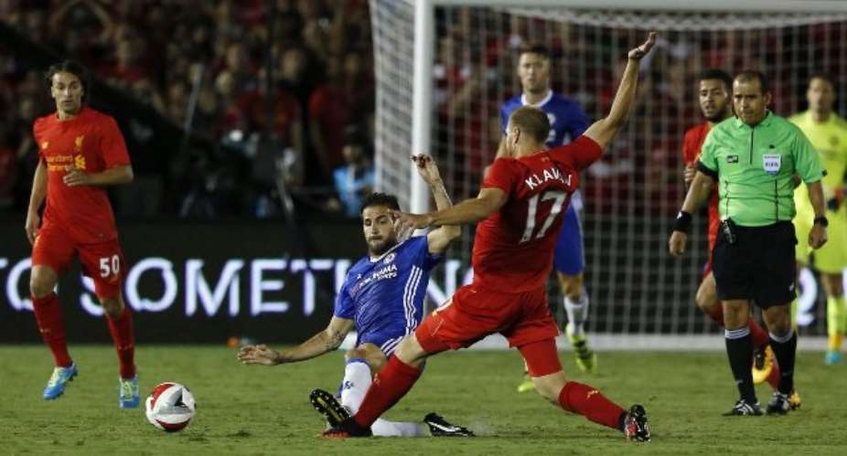 Cesc Fabregas sees red as Chelsea edge Liverpool in feisty friendly