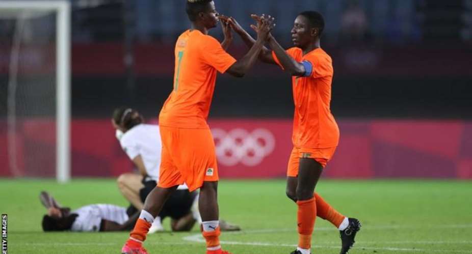 Ivory Coast's Idrissa Doumbia left and Max Gradel celebrate reaching the Olympic quarter-finals