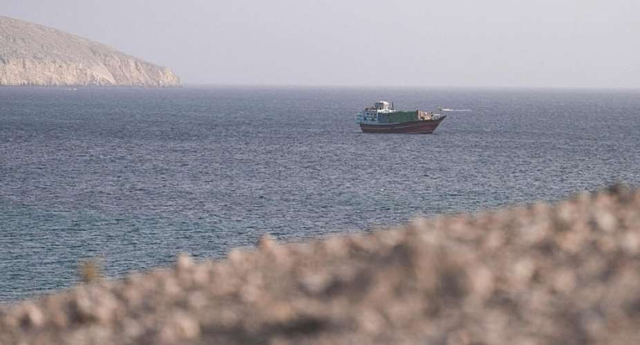 A vessel in the Strait of Hormuz, as seen from Musandam, Oman on July 16, 2026. -  Stringer, Reuters
