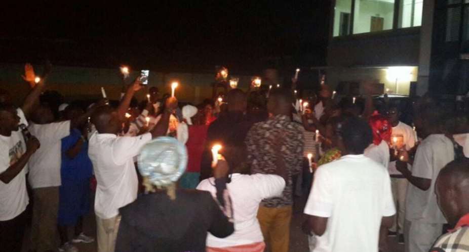 Candle light vigil held for jailed Montie 3 Photos