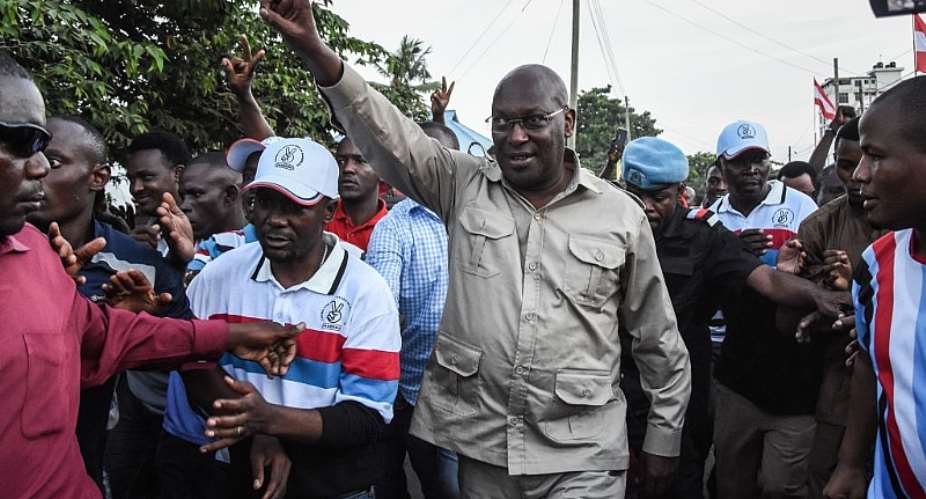 Tanzania opposition party leader Freeman Mbowe centre after being released from prison in Dar es Salaam in 2020. - Source: Photo by Ericky BoniphaceAFP via Getty Images