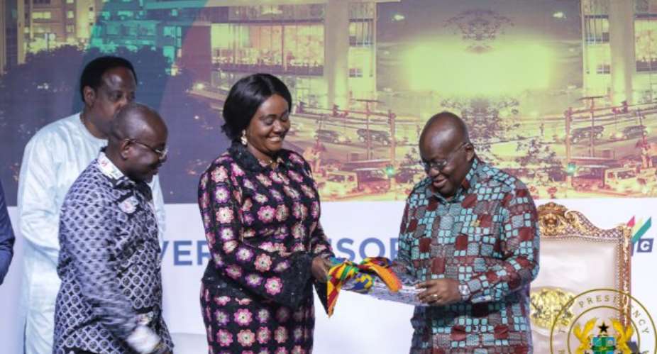 President AKufo-Addo receiving an award from Ministry of Tourism.