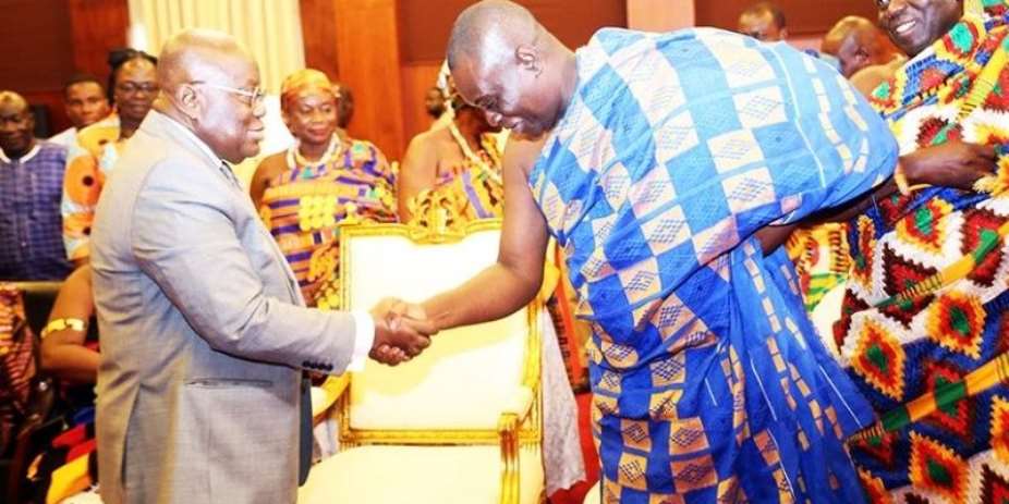 Dormaahene, Osagyefo Oseadeyo Agyeman Baduleft shaking President Akufo-Addo at an event