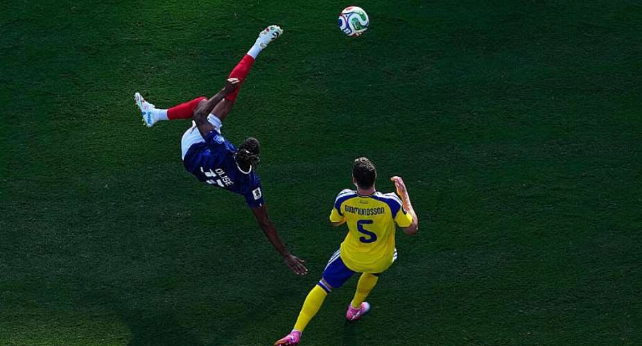 Michael OIise found the post with a spectacular bicycle kick during Frances crushing win over Sweden in the round of 32. -  Petr David Josek, AP