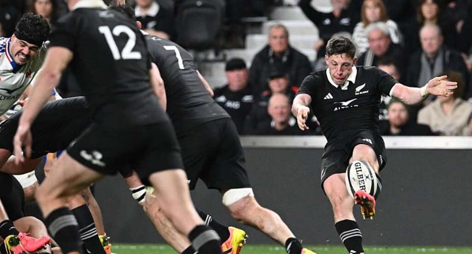 New Zealands Cam Roigard kicks the ball during the rugby Nations Championship match against France. -  Sanka Vidanagama, AFP