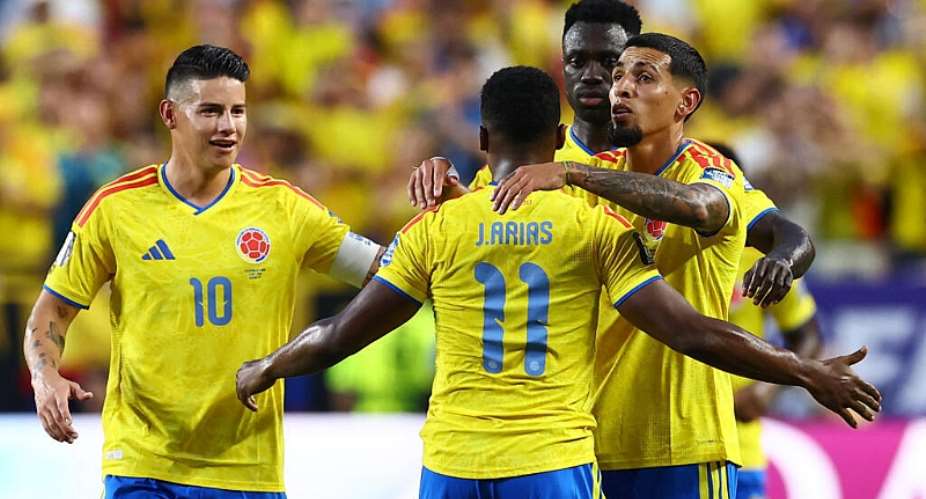 Colombias Jhon Arias celebrates scoring their first goal with Daniel Munoz, Davinson Sanchez and James Rodriguez. -  Bernadett Szabo, Reuters